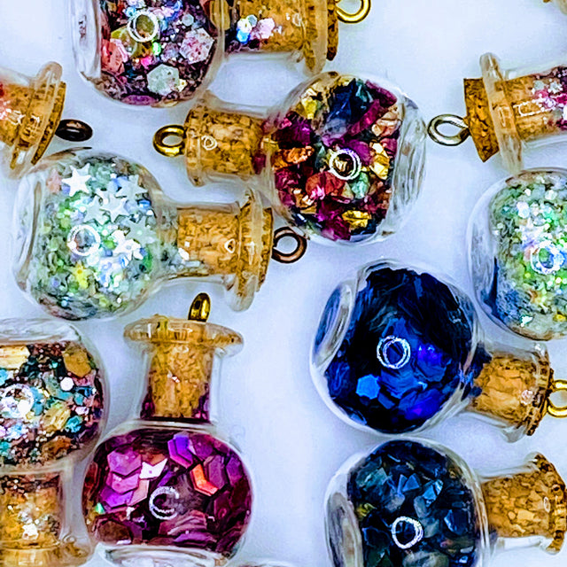 Bottle of glitter, blue.