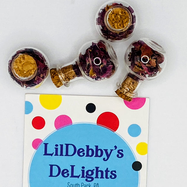 Bottle of dried rose petals.