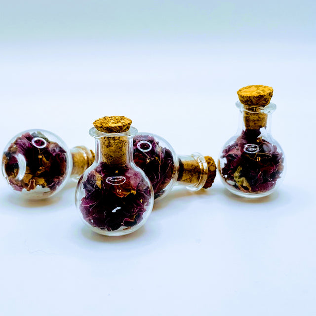 Bottle of dried rose petals.