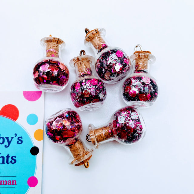 Bottle of glitter, pink.