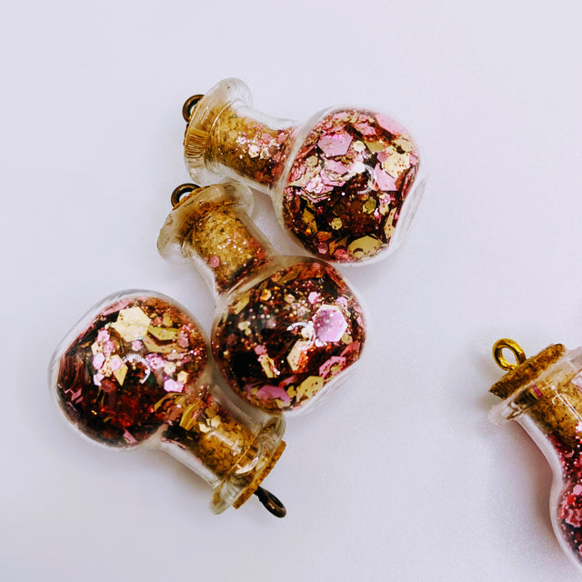 Bottle of glitter, pink.