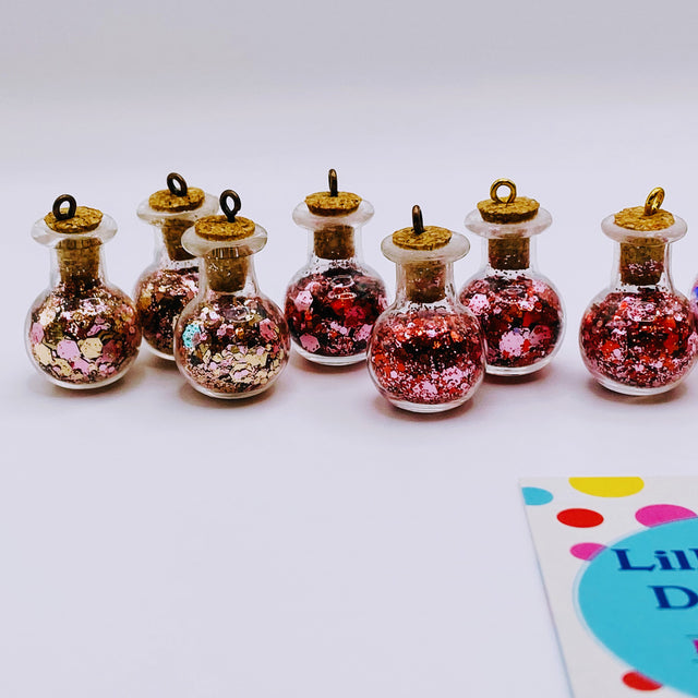 Bottle of glitter, pink.