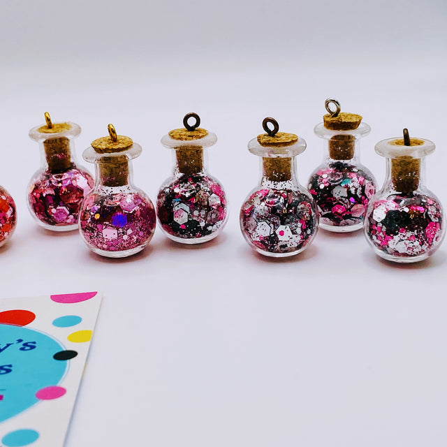 Bottle of glitter, pink.