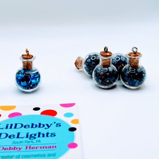 Bottle of glitter, blue.