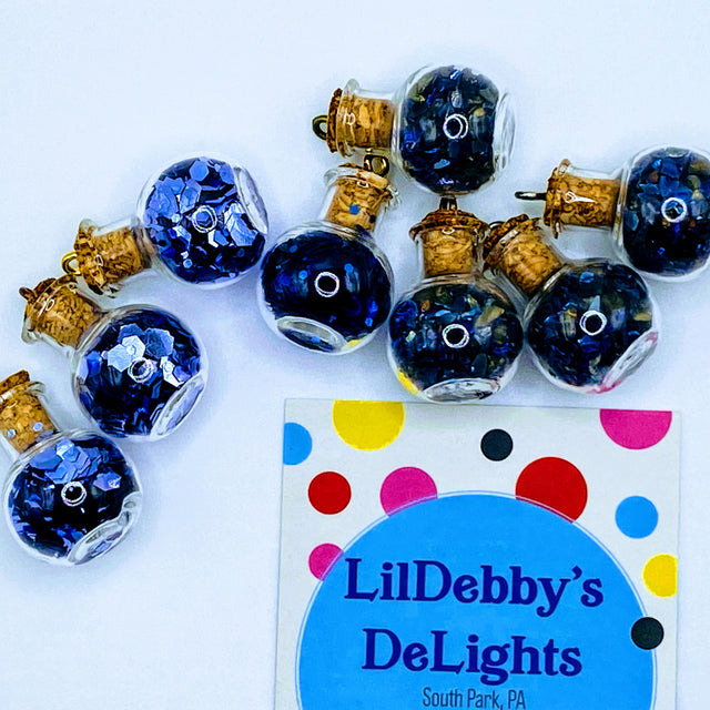 Bottle of glitter, blue.