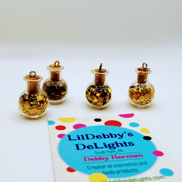 Bottle of glitter, gold.