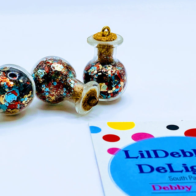 Bottle of glitter, blue mix.