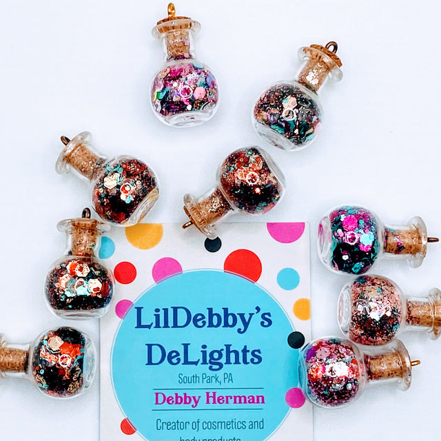 Bottle of glitter, blue mix.