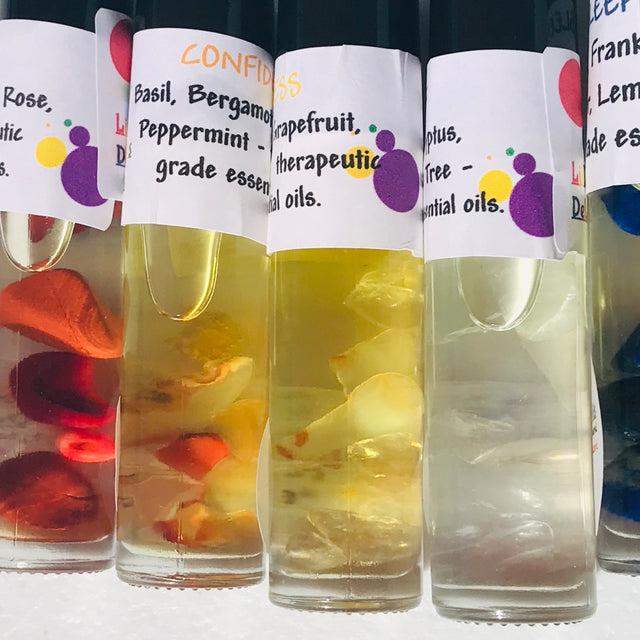 Soulful Scents. Essential Oil Roller blends infused with polished stones.